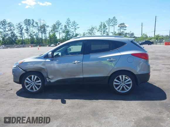 2013 Hyundai Tucson GLS with VIN KM8JU3AC4DU588062, listed as a IAAI auction lot 42080348 with 76,937 mi miles. Bid and sale history available at carsss.com. Image 14.