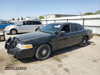 2010 Ford Police Interceptor with VIN 2FABP7BV0AX123585, listed as a Copart auction lot 61448955 with 95,173 mi miles and Salvage title. Bid and sale history available at DreamBid. Image 1.