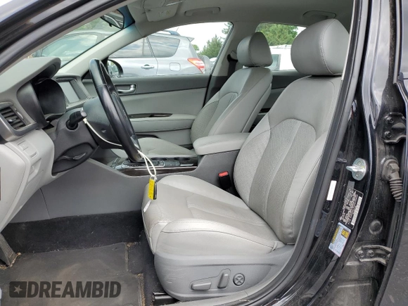2017 Kia Optima EX with VIN 5XXGU4L3XHG143659, listed as a Copart auction lot 59773115 with 66,001 mi miles and Salvage title. Bid and sale history available at DreamBid. Image 7.