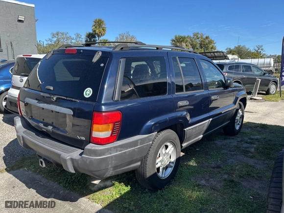 2004 Jeep Grand Cherokee Laredo with VIN 1J4GX48N24C436753, listed as a Copart auction lot 88142905 with 114,022 mi miles and Clean Title. Bid and sale history available at carsss.com. Image 4.