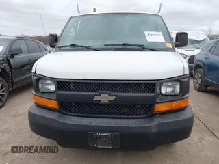 2015 Chevrolet Express Cargo Van with VIN 1GCWGFCFXF1259591, listed as a IAAI auction lot 42029679 with 144,023 mi miles. Bid and sale history available at carsss.com. Image 12.