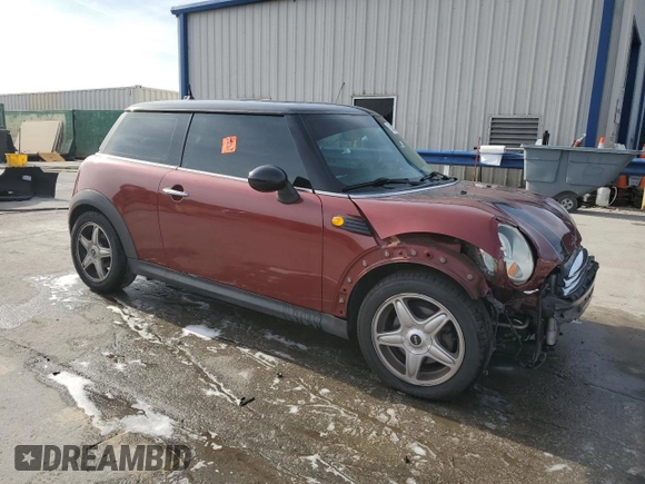 2007 MINI Hardtop with VIN WMWMF33577TT52975, listed as a Copart auction lot 53909855 with 127,325 mi miles and Salvage title. Bid and sale history available at DreamBid. Image 4.