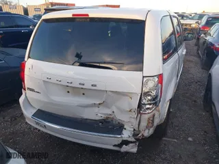 2016 Dodge Grand Caravan American Value Pkg with VIN 2C4RDGBG7GR328613, listed as a IAAI auction lot 41047847 with 104,603 mi miles. Bid and sale history available at carsss.com. Image 16.