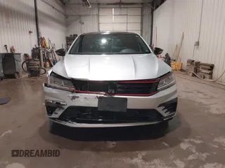 2018 Volkswagen Passat GT z VIN 1VWJM7A36JC047802, wystawiony jako IAAI lot #41714998 z przebiegiem 70 753 mil mil oraz . Historia ofert i sprzedaży dostępna na DreamBid. Obrazek 12.