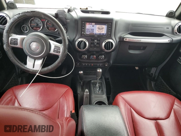 2013 Jeep Wrangler Unlimited Rubicon 10th Anniversary z VIN 1C4HJWFG3DL703331, wystawiony jako Copart lot #70823154 z przebiegiem 148 860 mil mil oraz Szkoda całkowita • Salvage title. Historia ofert i sprzedaży dostępna na DreamBid. Obrazek 8.