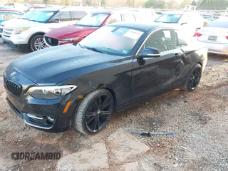 2015 BMW 2 Series 228i with VIN WBA1F5C55FV256604, listed as a IAAI auction lot 41841754 with 118,354 mi miles. Bid and sale history available at carsss.com. Image 2.