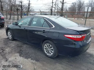 2015 Toyota Camry Hybrid LE with VIN 4T1BD1FK3FU164092, listed as a IAAI auction lot 41886726 with 396,189 mi miles. Bid and sale history available at carsss.com. Image 3.