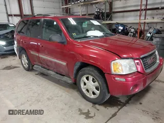 2003 GMC Envoy SLT with VIN 1GKDT13SX32134944, listed as a IAAI auction lot 41498519 with 149,640 mi miles. Bid and sale history available at carsss.com. Image 1.