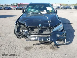 2018 BMW X5 xDrive40e iPerformance with VIN 5UXKT0C59J0W00801, listed as a IAAI auction lot 41081133 with 63,265 mi miles. Bid and sale history available at carsss.com. Image 6.