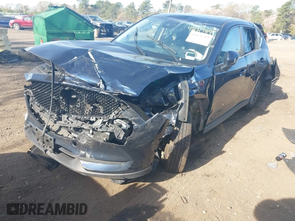 2019 Mazda CX-5 Touring with VIN JM3KFBCM6K0513037, listed as a IAAI auction lot 42121789 with 59,455 mi miles and . Bid and sale history available at DreamBid. Image 17.