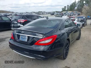 2013 Mercedes-Benz CLS-Class CLS 550 with VIN WDDLJ9BB1DA083618, listed as a IAAI auction lot 41794862 with 106,484 mi miles. Bid and sale history available at carsss.com. Image 4.