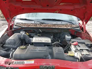 2004 Dodge Dakota Sport with VIN 1D7HG38N64S677103, listed as a IAAI auction lot 41665245 with 212,470 mi miles and . Bid and sale history available at carsss.com. Image 10.