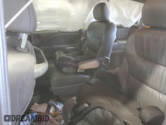2010 Honda Odyssey Touring with VIN 5FNRL3H91AB113770, listed as a Copart auction lot 61893115 with 155,776 mi miles and Salvage title. Bid and sale history available at DreamBid. Image 11.