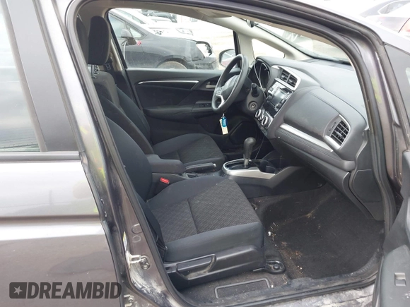 2015 Honda Fit LX with VIN 3HGGK5H58FM722880, listed as a IAAI auction lot 42276261 with 104,886 mi miles and . Bid and sale history available at DreamBid. Image 5.