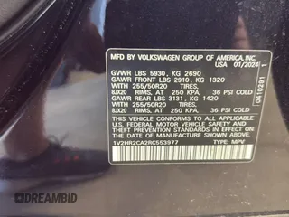 2024 Volkswagen Atlas SE with VIN 1V2HR2CA2RC553977, listed as a IAAI auction lot 42731405 with 24,692 mi miles and . Bid and sale history available at DreamBid. Image 2.
