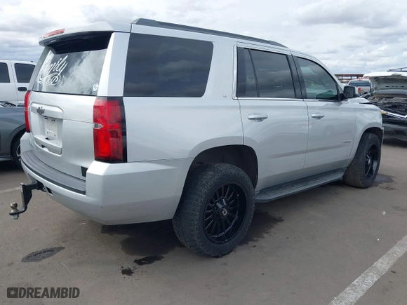 2018 Chevrolet Tahoe LT with VIN 1GNSCBKC2JR115318, listed as a IAAI auction lot 41809253 with 107,217 mi miles. Bid and sale history available at carsss.com. Image 4.