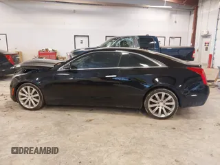 2016 Cadillac ATS AWD z VIN 1G6AG1RX2G0167642, wystawiony jako IAAI lot #41708537 z przebiegiem 217 560 mil mil oraz . Historia ofert i sprzedaży dostępna na DreamBid. Obrazek 14.