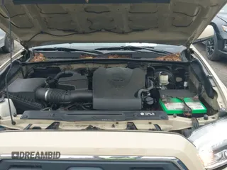 2016 Toyota Tacoma SR with VIN 3TMCZ5AN1GM020212, listed as a IAAI auction lot 42668716 with 106,543 mi miles and . Bid and sale history available at DreamBid. Image 19.