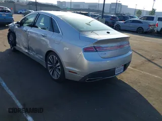 2019 Lincoln MKZ Hybrid Reserve II with VIN 3LN6L5MU6KR611449, listed as a IAAI auction lot 41465414 with Not provided miles and . Bid and sale history available at DreamBid. Image 3.