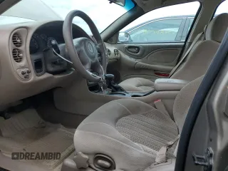 2004 Pontiac Bonneville SE z VIN 1G2HX52K44U162484, wystawiony jako Copart lot #57624535 z przebiegiem 85 193 mil mil oraz Szkody całkowita. Historia ofert i sprzedaży dostępna na DreamBid. Obrazek 7.