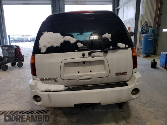 2005 GMC Envoy SLT z VIN 1GKET16S856105230, wystawiony jako Copart lot #86514644 z przebiegiem Nie podano mil oraz Czysty tytuł • Clean title. Historia ofert i sprzedaży dostępna na DreamBid. Obrazek 6.