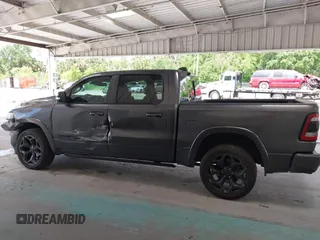 2021 Ram 1500 Limited with VIN 1C6SRFHTXMN536566, listed as a IAAI auction lot 42470029 with 50,728 mi miles and . Bid and sale history available at DreamBid. Image 14.