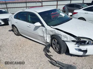 2014 Chevrolet Impala LS with VIN 2G1WA5E37E1189080, listed as a IAAI auction lot 42607058 with 128,337 mi miles and . Bid and sale history available at DreamBid. Image 6.