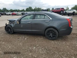 2015 Cadillac ATS Standard AWD with VIN 1G6AG5RX1F0141720, listed as a Copart auction lot 61797225 with 127,134 mi miles and Salvage title. Bid and sale history available at DreamBid. Image 2.