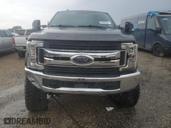 2018 Ford F-250 XL with VIN 1FT7W2B65JEB83300, listed as a Copart auction lot 55920255 with 104,125 mi miles and Salvage title. Bid and sale history available at DreamBid. Image 5.