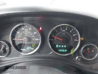 2015 Jeep Wrangler Unlimited Sahara with VIN 1C4BJWEG6FL603265, listed as a IAAI auction lot 41956606 with 70,983 mi miles. Bid and sale history available at carsss.com. Image 7.