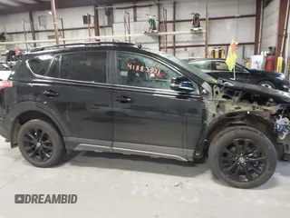 2018 Toyota RAV4 XLE with VIN 2T3RFREV0JW715761, listed as a IAAI auction lot 41881863 with 67,534 mi miles and . Bid and sale history available at DreamBid. Image 13.