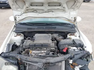 2009 Kia Spectra EX with VIN KNAFE221195609687, listed as a IAAI auction lot 42138825 with 105,170 mi miles. Bid and sale history available at carsss.com. Image 10.