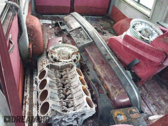 1991 Chevrolet Astro Cargo z VIN 1GBDM19Z4MB136076, wystawiony jako IAAI lot #41482281 z przebiegiem 202 682 mil mil oraz . Historia ofert i sprzedaży dostępna na DreamBid. Obrazek 12.