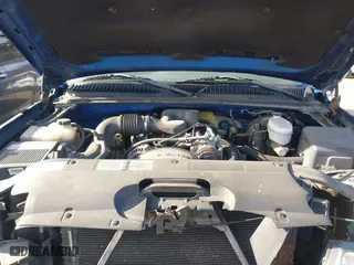 2003 Chevrolet Silverado 1500 Work Truck with VIN 1GCEC19X33Z360611, listed as a IAAI auction lot 41274217 with 152,523 mi miles. Bid and sale history available at carsss.com. Image 10.