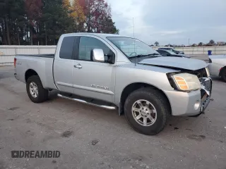 2005 Nissan Titan SE with VIN 1N6BA06B45N539629, listed as a Copart auction lot 82527074 with 154,255 mi miles and Salvage title. Bid and sale history available at DreamBid. Image 4.