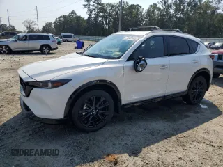 2024 Mazda CX-5 2.5 Carbon Turbo with VIN JM3KFBAY5R0403323, listed as a Copart auction lot 75307144 with 2,842 mi miles and Salvage Title. Bid and sale history available at carsss.com. Image 1.