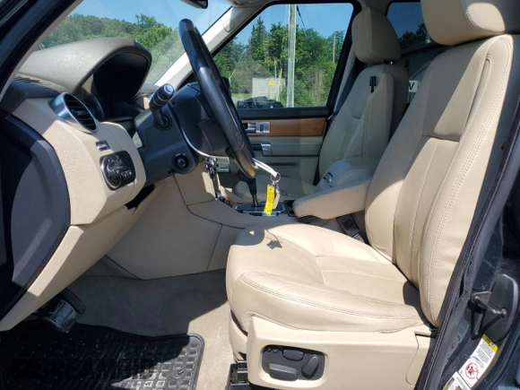 2013 Land Rover LR4 Lux with VIN SALAK2D44DA680582, listed as a Copart auction lot 63627765 with 94,326 mi miles and Salvage title. Bid and sale history available at DreamBid. Image 7.