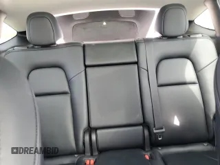2022 Tesla Model Y Performance с VIN 7SAYGDEF4NF403784, выставлен на аукционе Copart как лот 53392595 с пробегом 51 023 миль миль и Списание • Salvage title. История ставок и продаж доступна на DreamBid. Изображение 10.