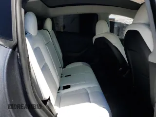 2024 Tesla Model Y Long Range with VIN 7SAYGDEEXRA215975, listed as a Copart auction lot 56705585 with 20,554 mi miles and Salvage Title. Bid and sale history available at DreamBid. Image 10.