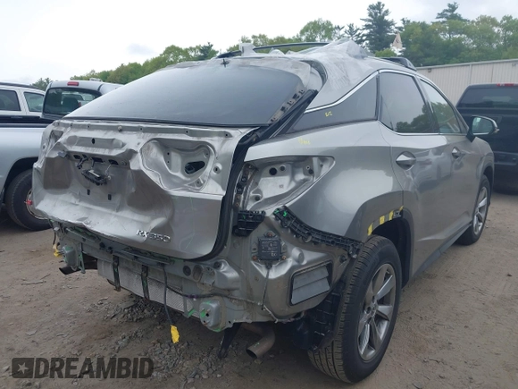 2018 Lexus RX 350 z VIN 2T2BZMCA4JC157690, wystawiony jako IAAI lot #42155397 z przebiegiem 104 075 mil mil oraz . Historia ofert i sprzedaży dostępna na DreamBid. Obrazek 4.