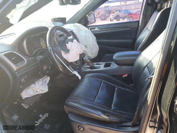 2017 Jeep Grand Cherokee Overland with VIN 1C4RJECGXHC659417, listed as a Copart auction lot 80168894 with 118,934 mi miles and Salvage Title. Bid and sale history available at carsss.com. Image 7.