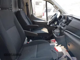 2023 Ford Transit Cargo with VIN 1FTBR1Y86PKA79798, listed as a IAAI auction lot 40155361 with 28,670 mi miles and . Bid and sale history available at DreamBid. Image 5.