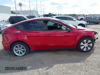 2020 Tesla Model Y Long Range with VIN 5YJYGDEE9LF009957, listed as a IAAI auction lot 41780248 with 31,053 mi miles and . Bid and sale history available at DreamBid. Image 14.
