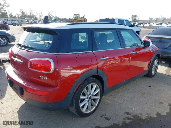 2016 MINI Cooper Clubman with VIN WMWLN5C58G2E30425, listed as a IAAI auction lot 41955202 with 100,798 mi miles. Bid and sale history available at carsss.com. Image 4.
