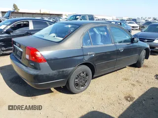 2001 Honda Civic LX with VIN JHMES16541S006574, listed as a IAAI auction lot 42162269 with 219,680 mi miles. Bid and sale history available at carsss.com. Image 4.