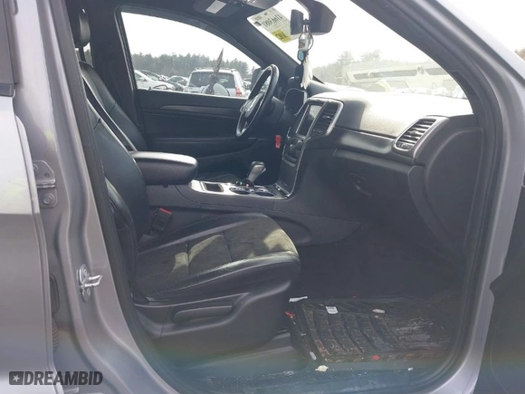 2018 Jeep Grand Cherokee Laredo E with VIN 1C4RJFAG1JC487082, listed as a IAAI auction lot 41663081 with 136,853 mi miles. Bid and sale history available at carsss.com. Image 5.