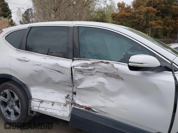 2019 Honda CR-V EX with VIN 5J6RW2H55KL009824, listed as a IAAI auction lot 41921911 with 93,690 mi miles and . Bid and sale history available at DreamBid. Image 6.