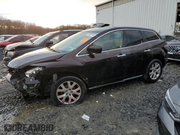2007 Mazda CX-7 Sport with VIN JM3ER29L570120611, listed as a Copart auction lot 86691444 with 128,486 mi miles and Salvage Title. Bid and sale history available at carsss.com. Image 1.