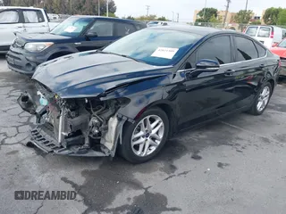 2016 Ford Fusion SE with VIN 3FA6P0H72GR331685, listed as a IAAI auction lot 42021509 with 149,977 mi miles. Bid and sale history available at carsss.com. Image 2.