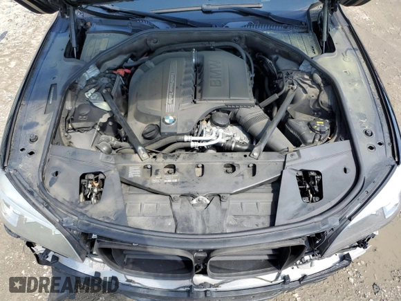 2015 BMW 7 Series 740i z VIN WBAYA6C59FD826788, wystawiony jako Copart lot #55747215 z przebiegiem 134 960 mil mil oraz Szkoda całkowita • Salvage title. Historia ofert i sprzedaży dostępna na DreamBid. Obrazek 11.